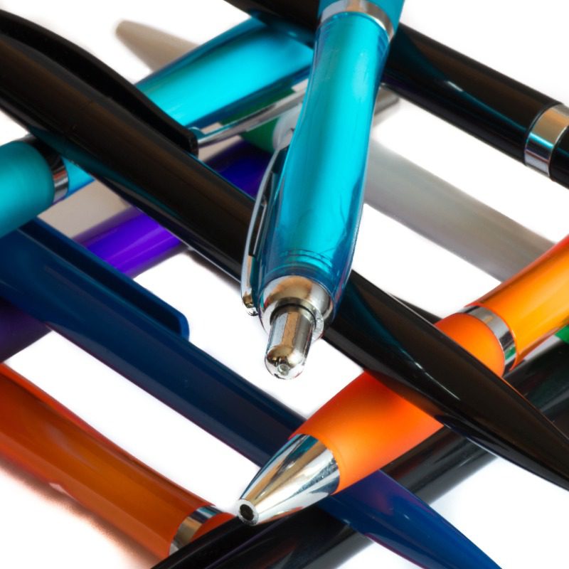 Colourful pens on on each other